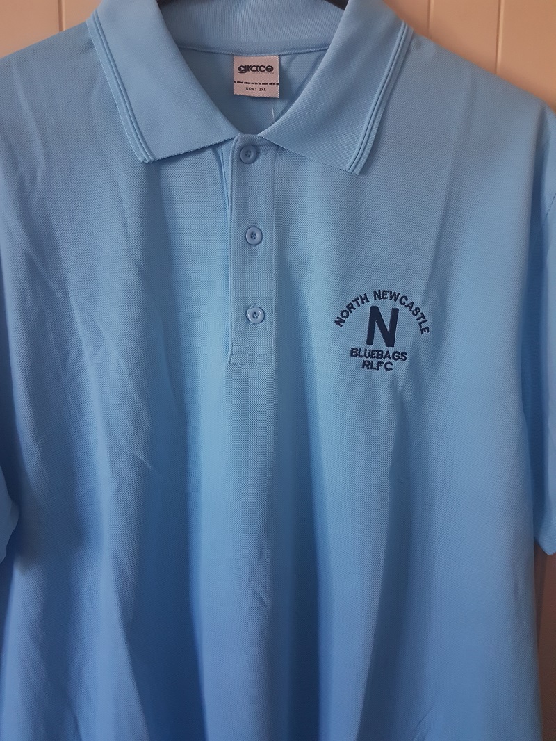 Norths light blue polo shirt.