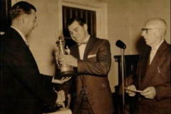 Doug Jones receiving Bert Agland Trophy 1957.
