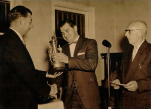 Doug Jones receiving Bert Agland Trophy 1957.